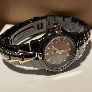 Elgin Women's Black and Gold Watch